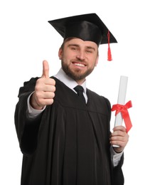 Happy student with graduation hat and diploma against white background, focus on hand