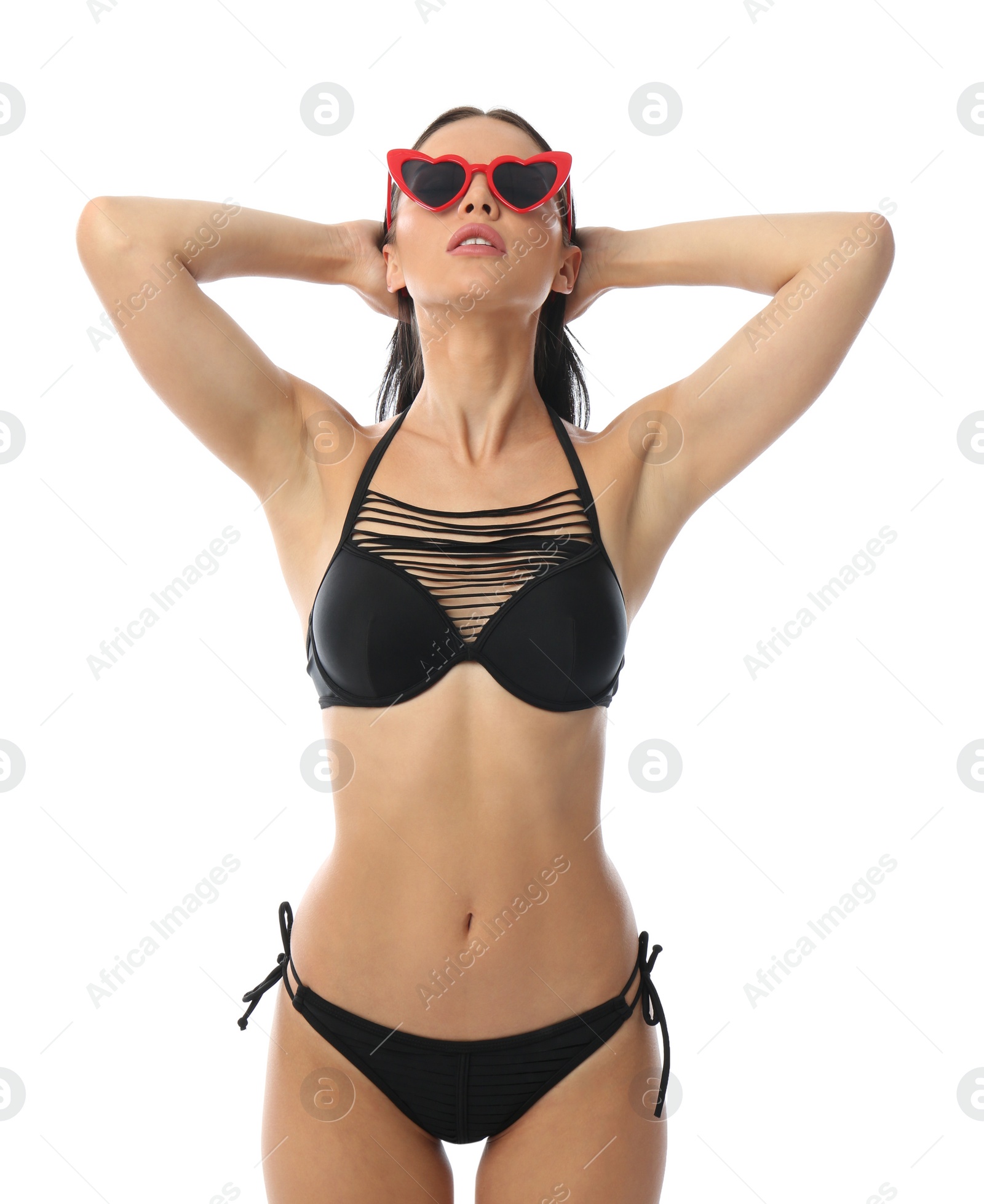 Photo of Beautiful young woman in black bikini with sunglasses on white background