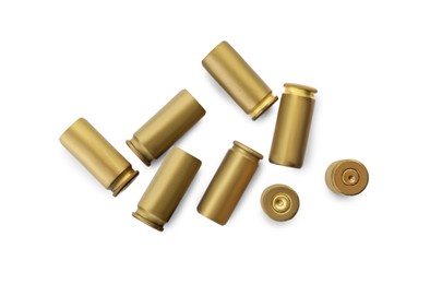 Photo of Shells of bullets on white background, top view