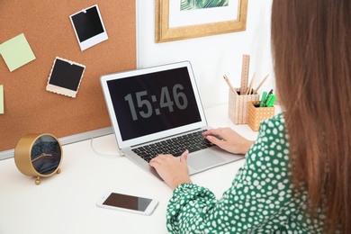 Photo of Woman using computer in home office. Stylish workplace