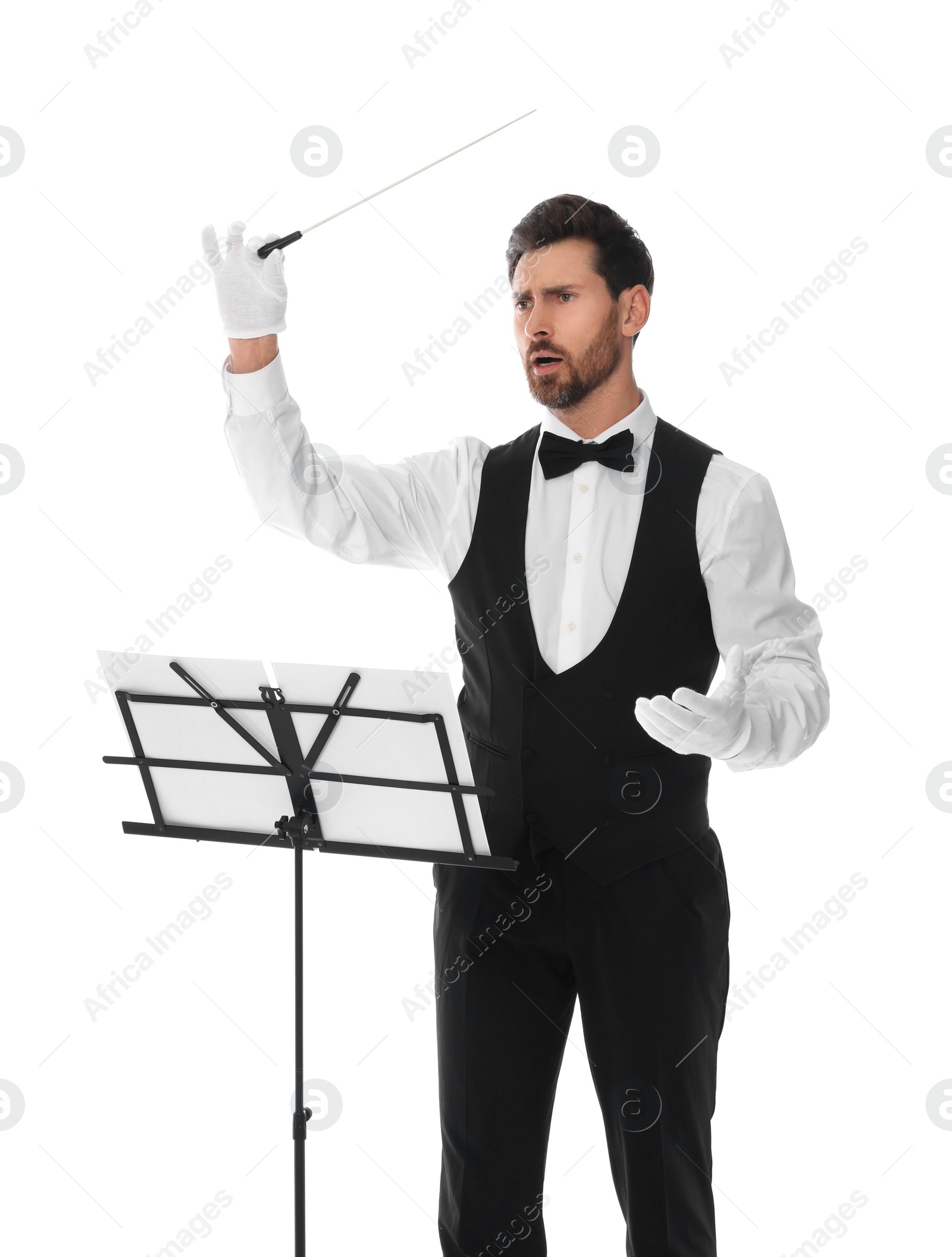 Photo of Professional conductor with baton and note stand on white background