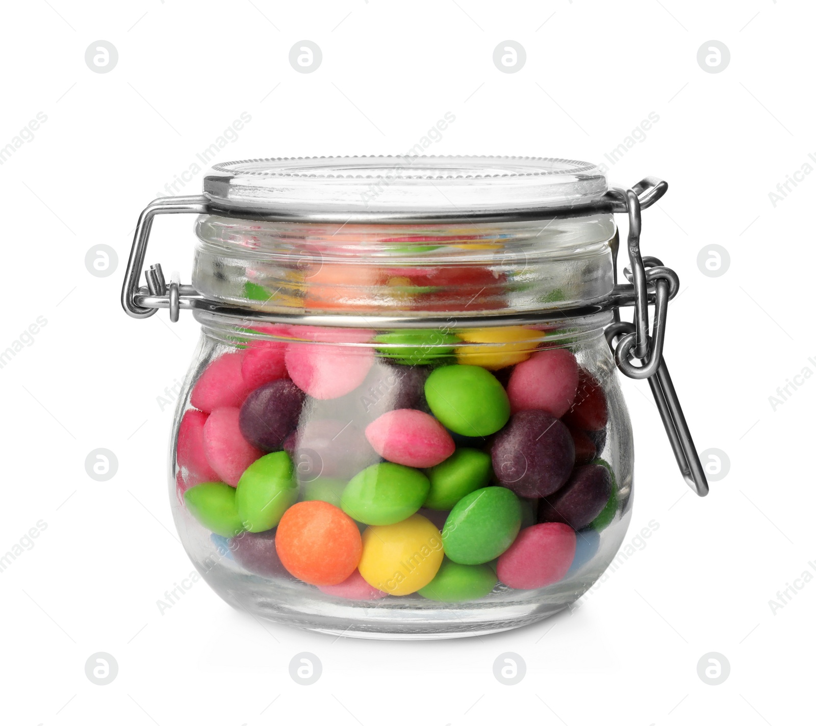 Photo of Many tasty candies in glass jar isolated on white