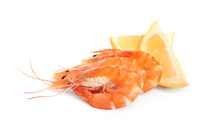 Delicious cooked shrimps and lemon isolated on white