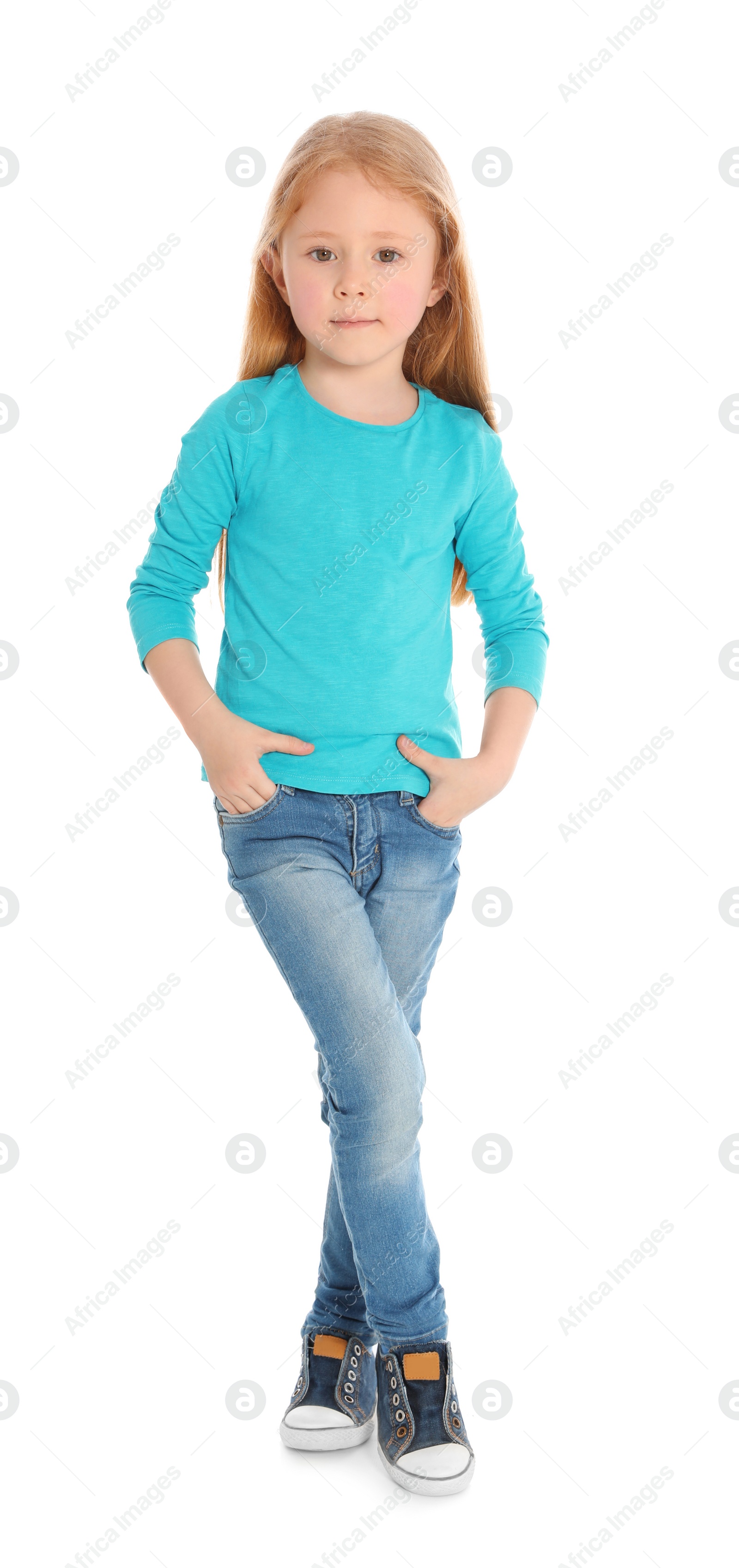 Photo of Full length portrait of cute little girl in casual outfit on white background