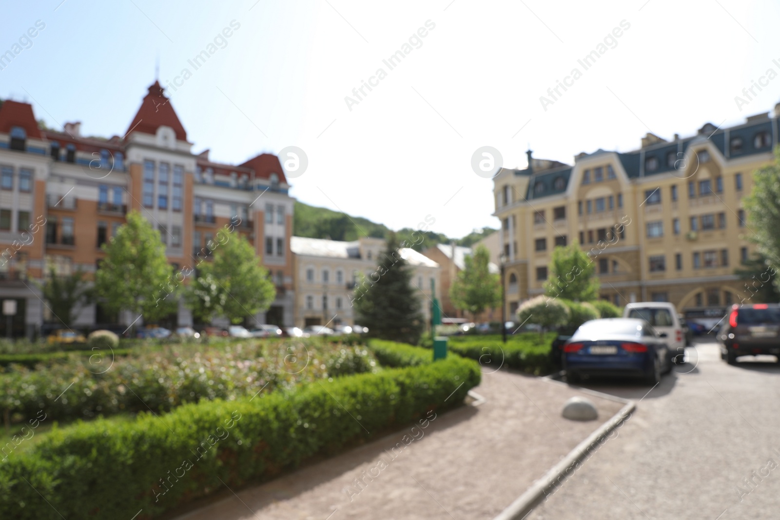 Photo of Blurred view of buildings with beautiful windows in city