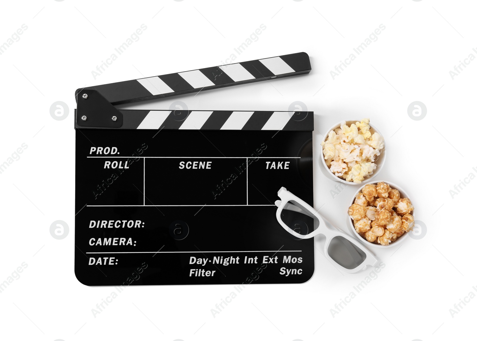 Photo of Movie clapper, buckets of tasty popcorn and glasses isolated on white, top view