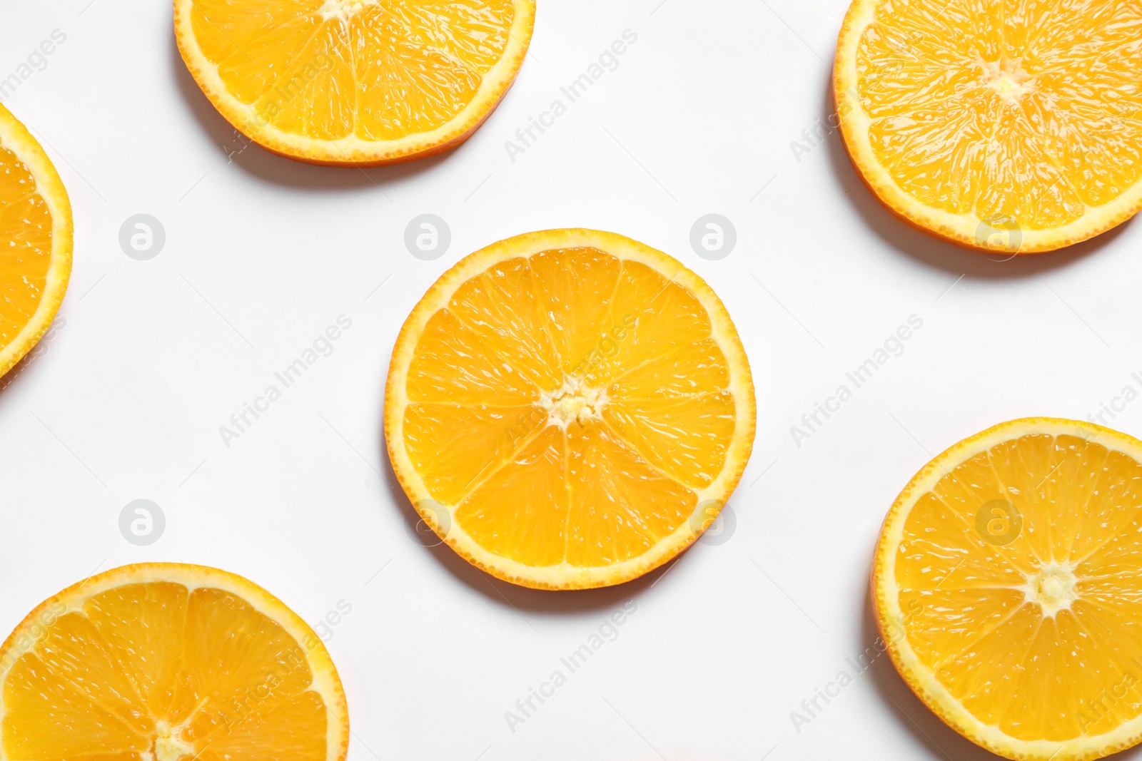 Photo of Composition with orange slices on white background, top view