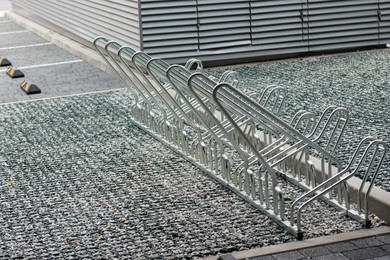 Empty metal parking rack for bicycles outdoors