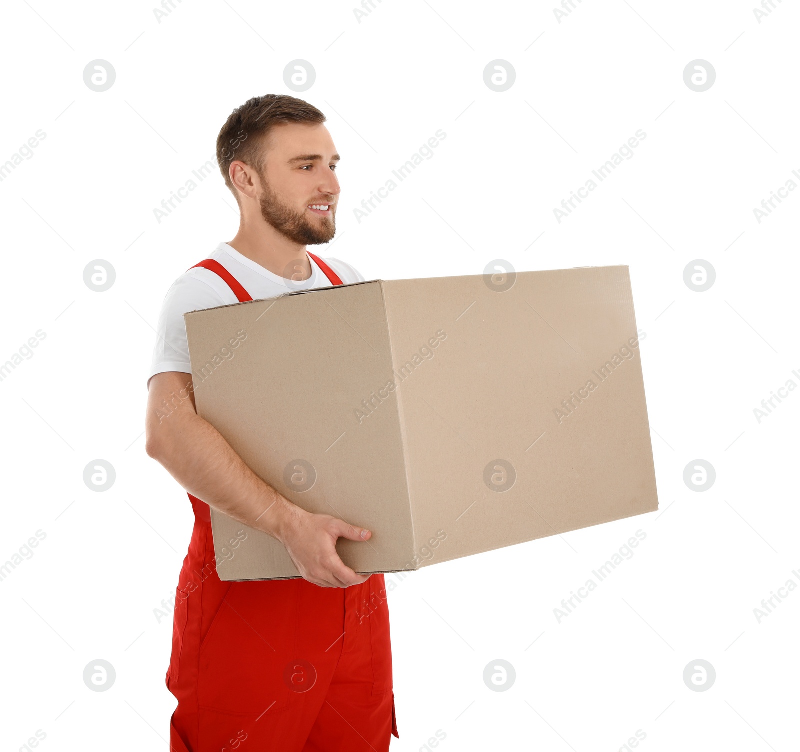 Photo of Young worker carrying box isolated on white. Moving service