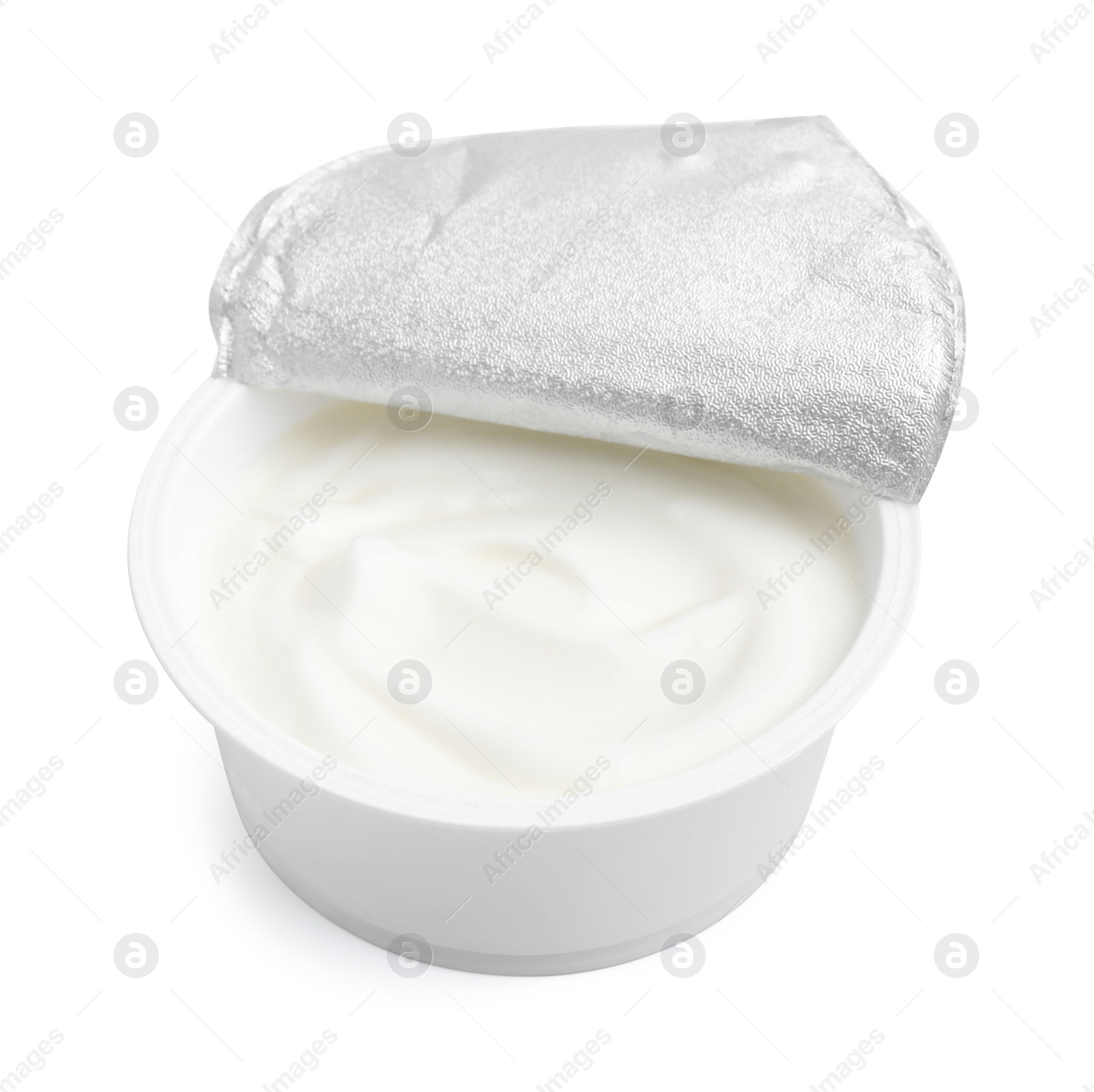 Photo of Delicious natural yogurt in plastic cup isolated on white