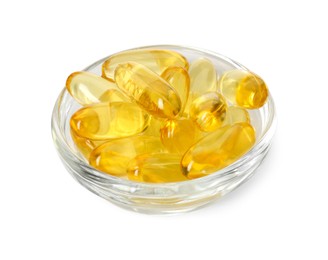 Vitamin capsules in bowl isolated on white. Health supplement