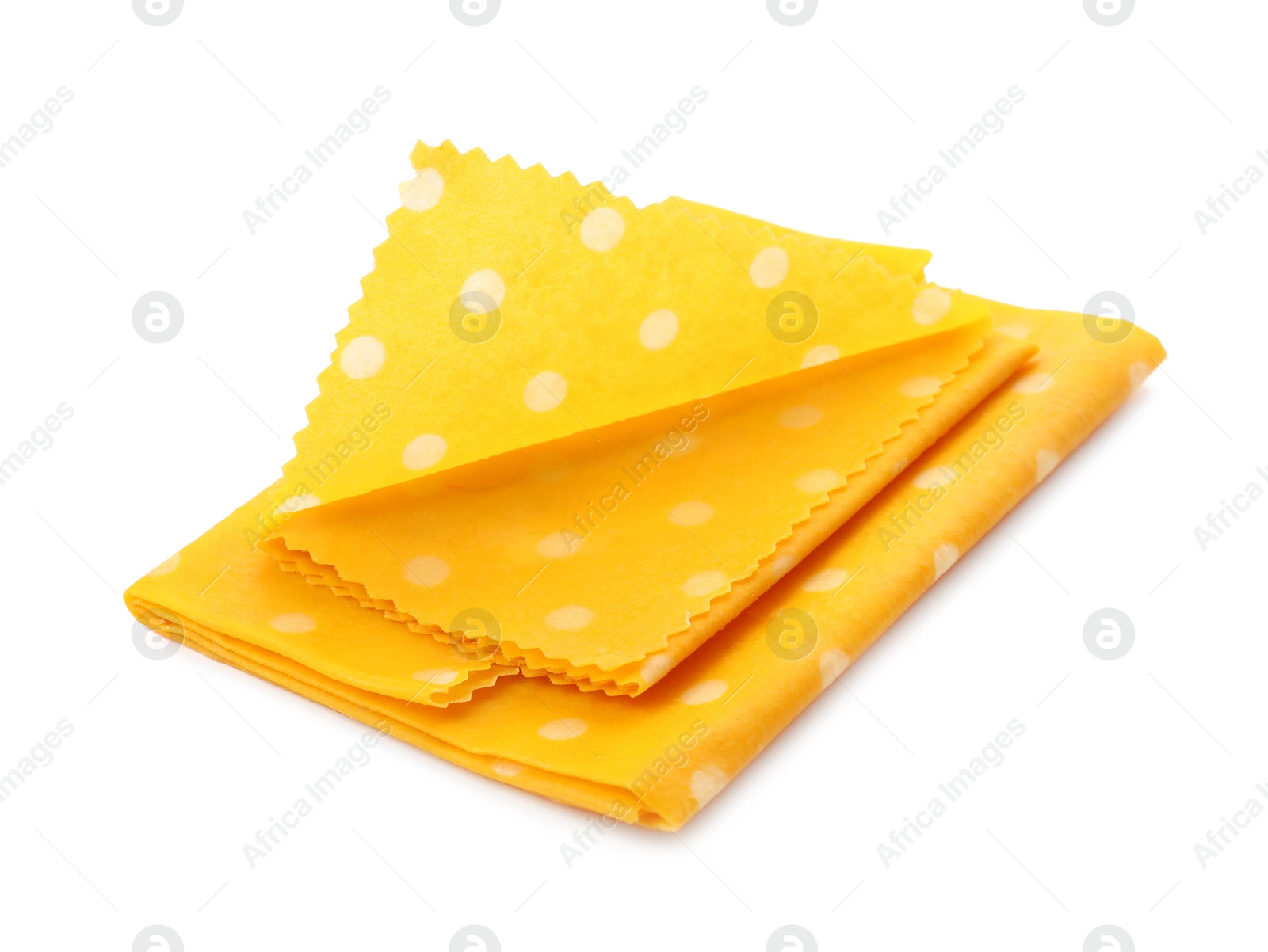 Photo of Reusable beeswax food wraps on white background