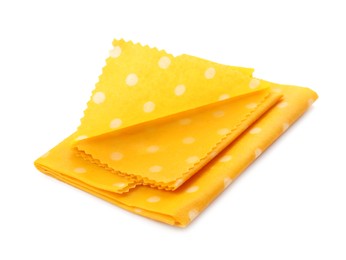 Photo of Reusable beeswax food wraps on white background