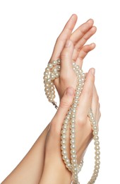 Photo of Woman holding elegant pearl necklace on white background, closeup