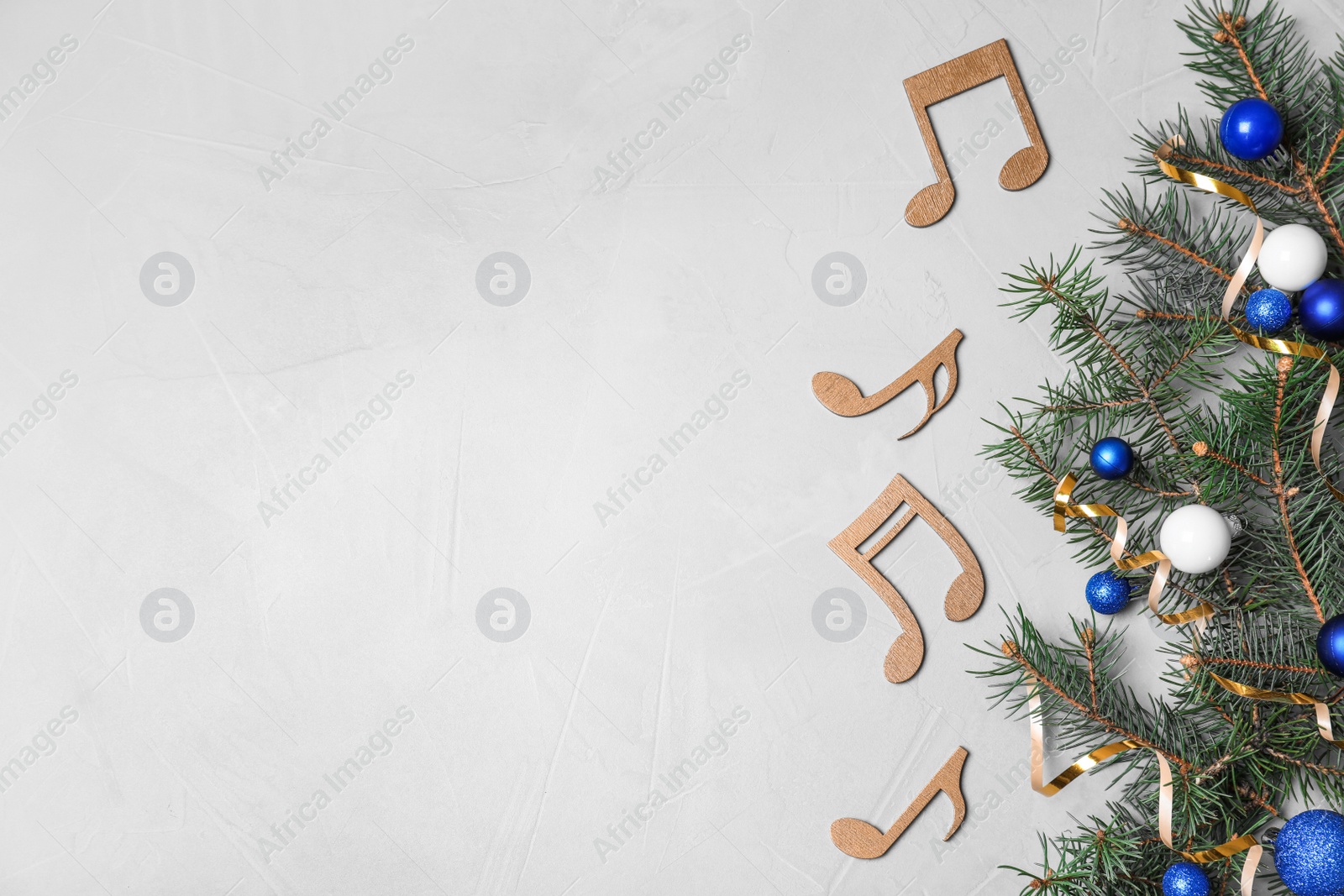 Photo of Composition with wooden music notes and space for text on grey background, top view