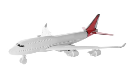 Photo of Toy airplane isolated on white. Travel concept