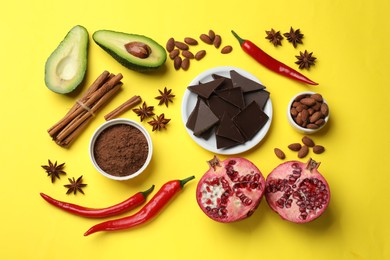 Photo of Natural aphrodisiac. Different products on yellow background, flat lay