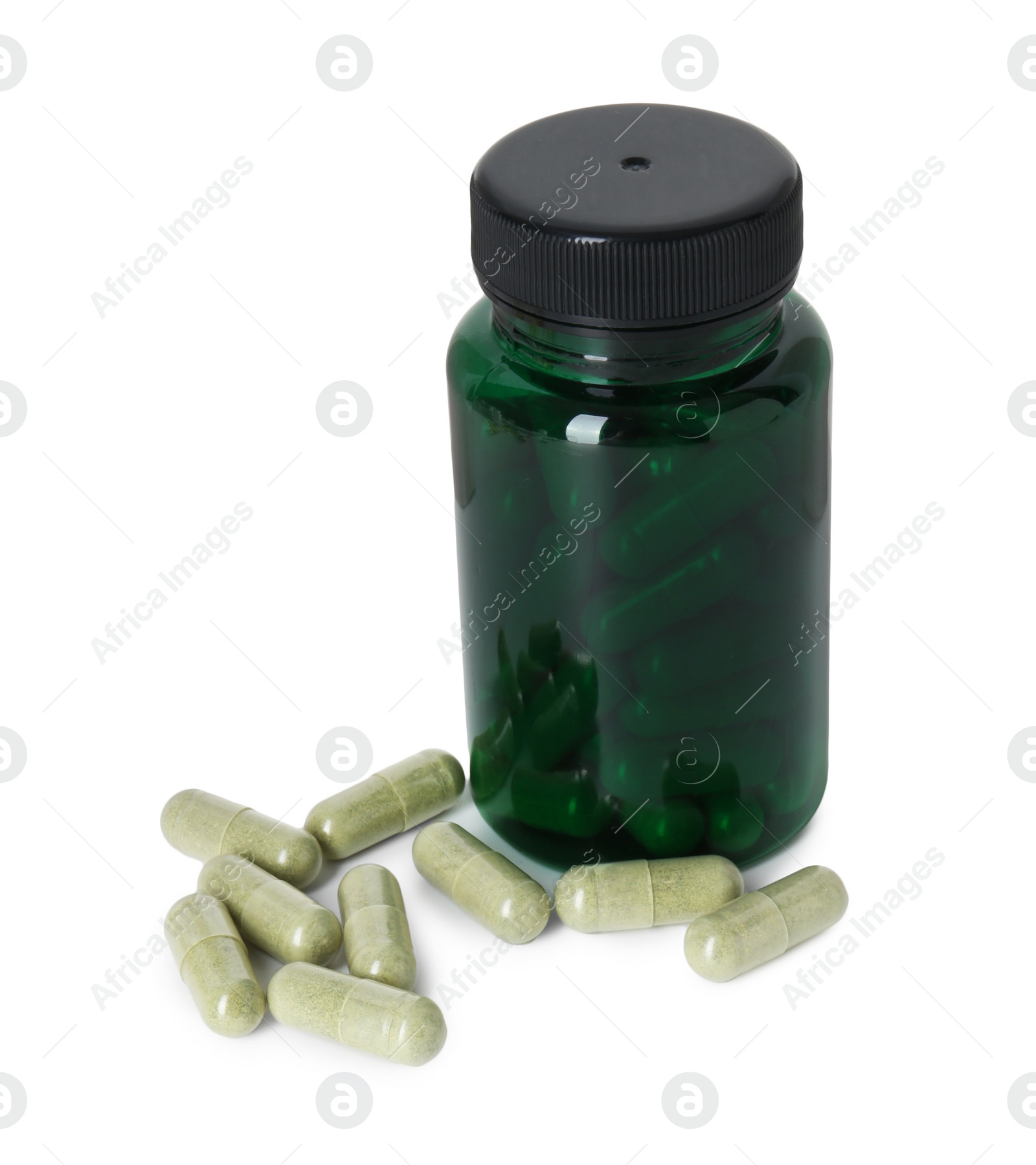 Photo of Bottle and pile of vitamin pills isolated on white