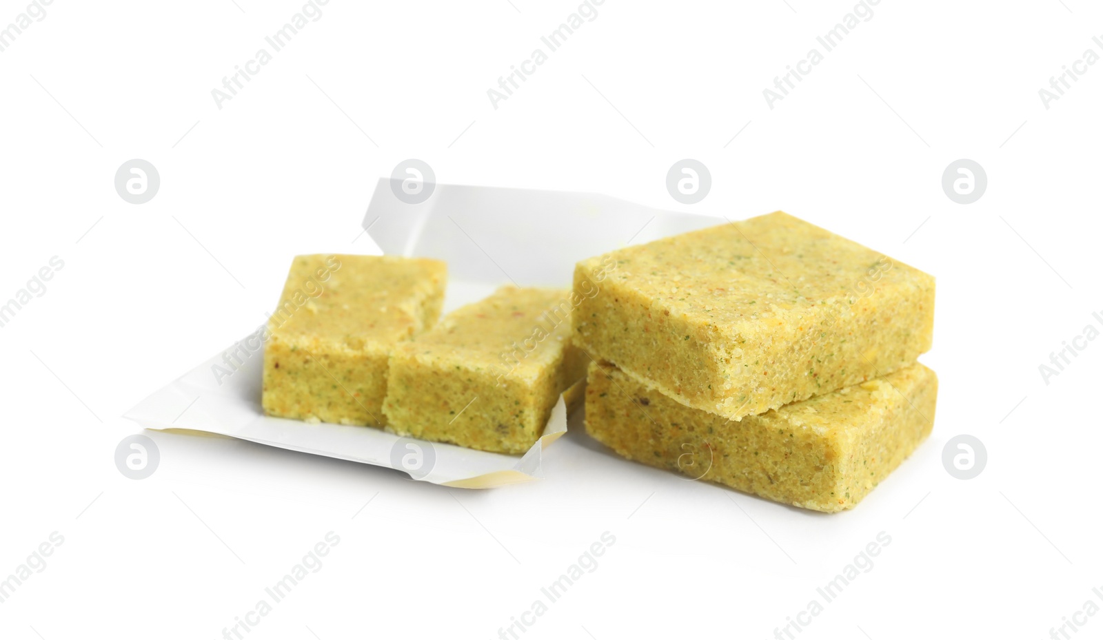 Photo of Bouillon cubes on white background. Broth concentrate