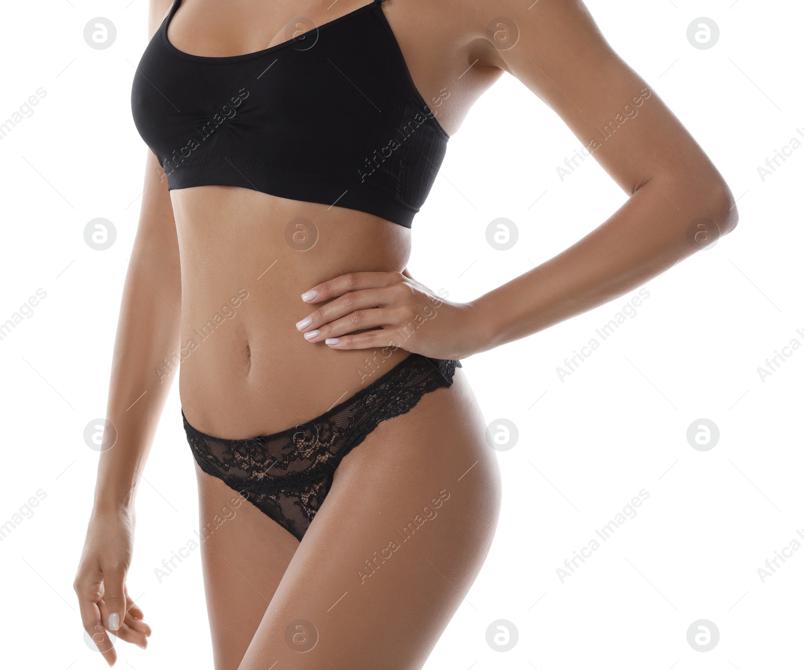 Photo of Woman in sexy black panties and top on white background, closeup