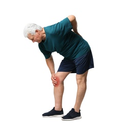 Photo of Full length portrait of senior man having knee problems on grey background
