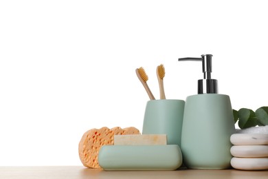 Bath accessories. Different personal care products on wooden table against white background. Space for text