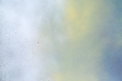 Photo of Texture of abstract spray paint as background, top view