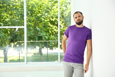 Photo of Portrait of man in casual clothes indoors