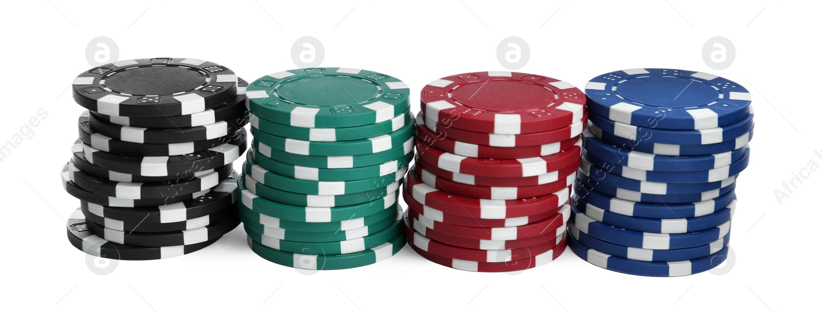 Photo of Plastic casino chips stacked on white background. Poker game