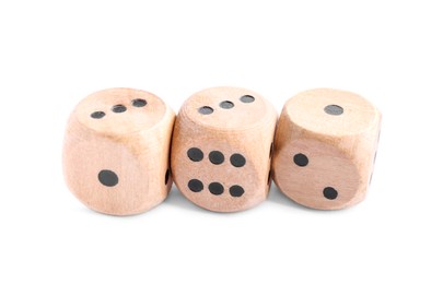 Photo of Three wooden game dices isolated on white