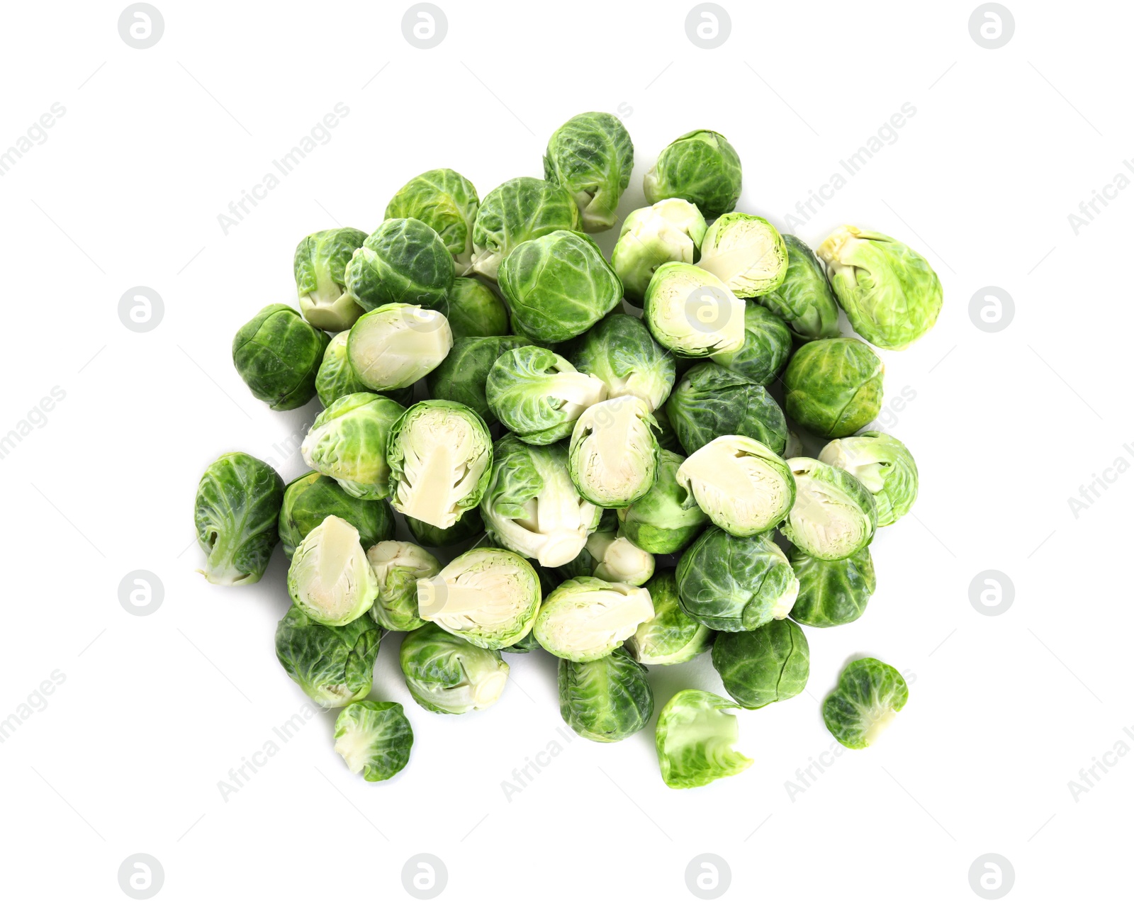 Photo of Pile of fresh Brussels sprouts isolated on white, top view