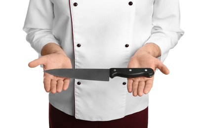 Photo of Chief cook holding clean sharp knife on white background, closeup
