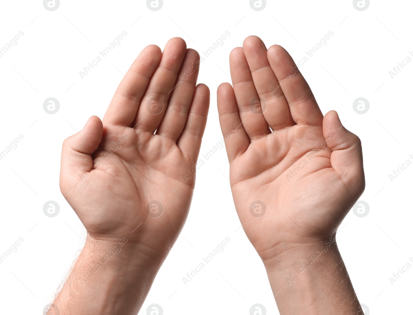 Photo of Religion. Man with open palms praying on white background, closeup