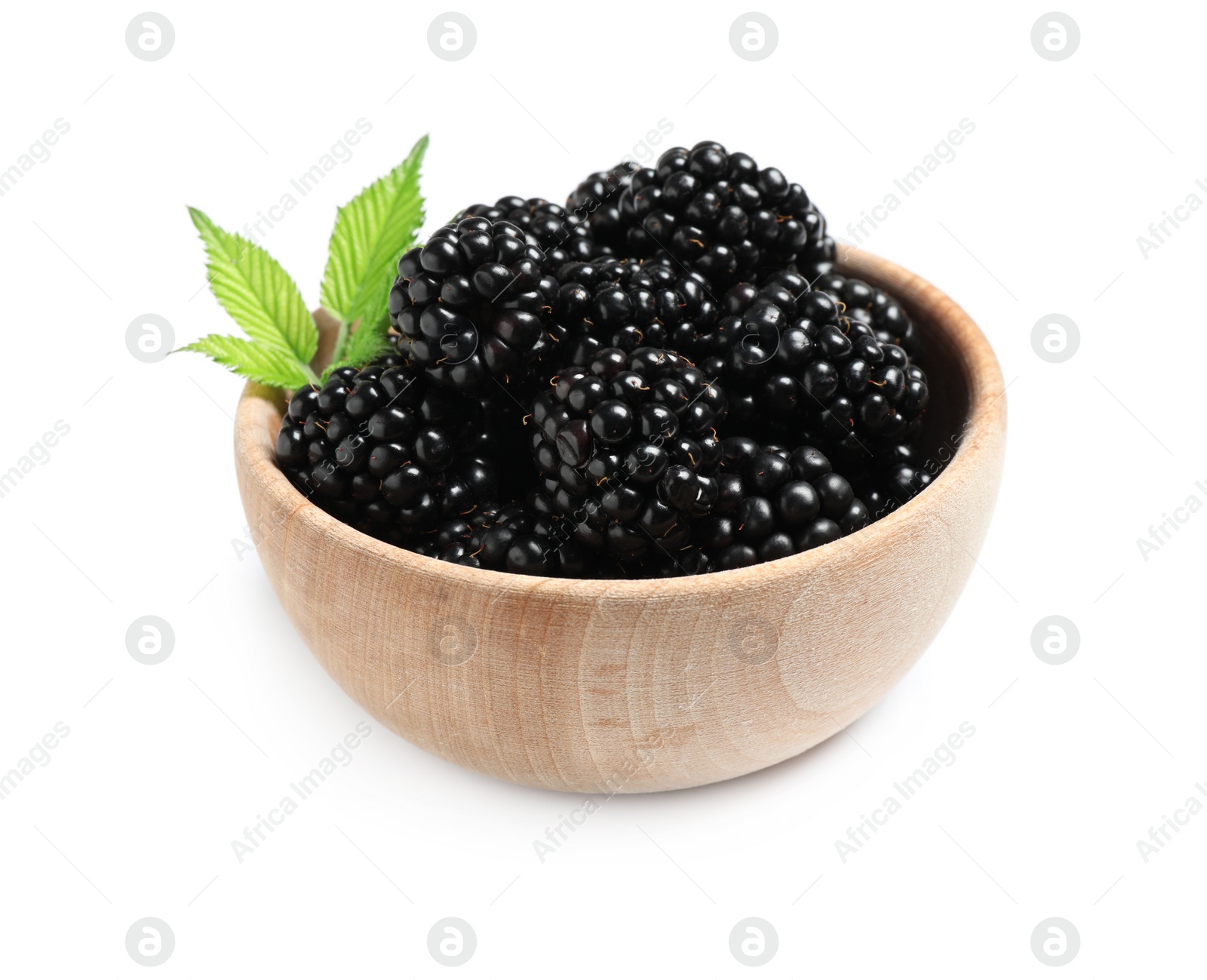 Photo of Fresh ripe blackberries in bowl isolated on white
