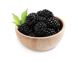 Photo of Fresh ripe blackberries in bowl isolated on white