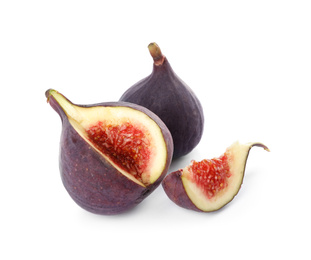 Photo of Whole and cut tasty fresh figs isolated on white