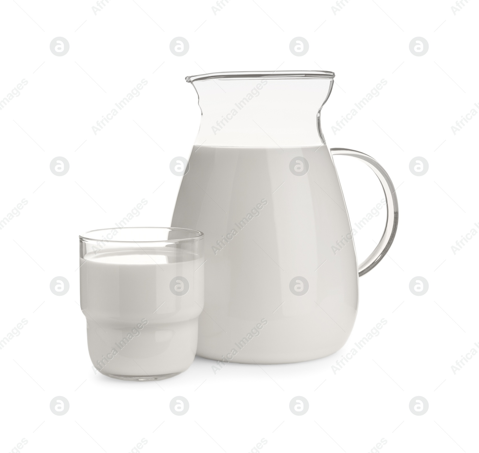 Photo of Jug and glass with fresh milk on white background