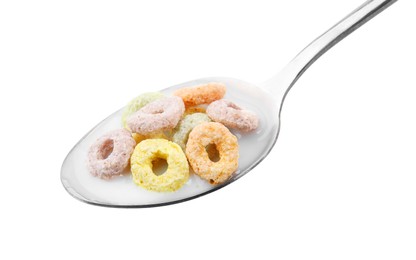 Photo of Cereal rings and milk in spoon isolated on white