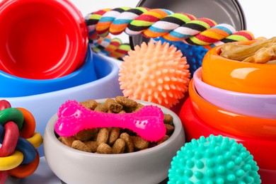 Different pet goods on white background, closeup. Shop assortment