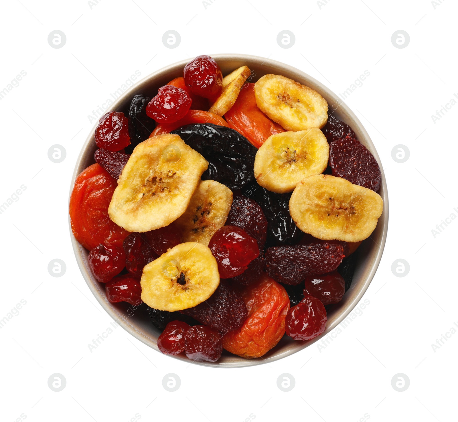 Photo of Mix of delicious dried fruits in bowl isolated on white, top view