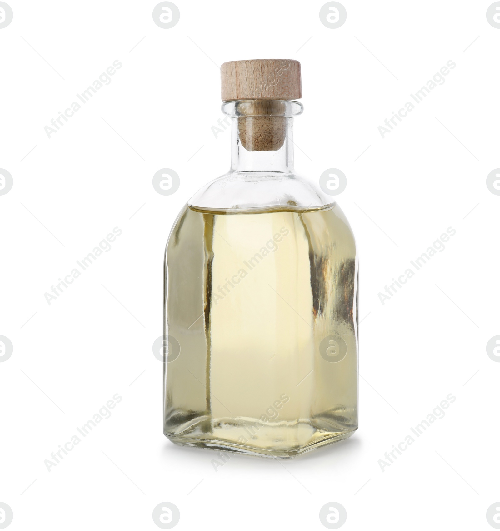 Photo of Glass bottle of apple vinegar on white background