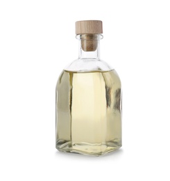 Photo of Glass bottle of apple vinegar on white background
