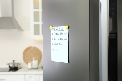 To do list on fridge in kitchen. Space for text