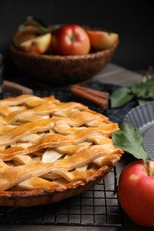 Delicious traditional apple pie on table, closeup