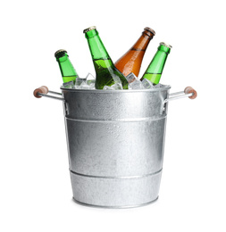 Photo of Metal bucket with bottles of beer and ice cubes isolated on white