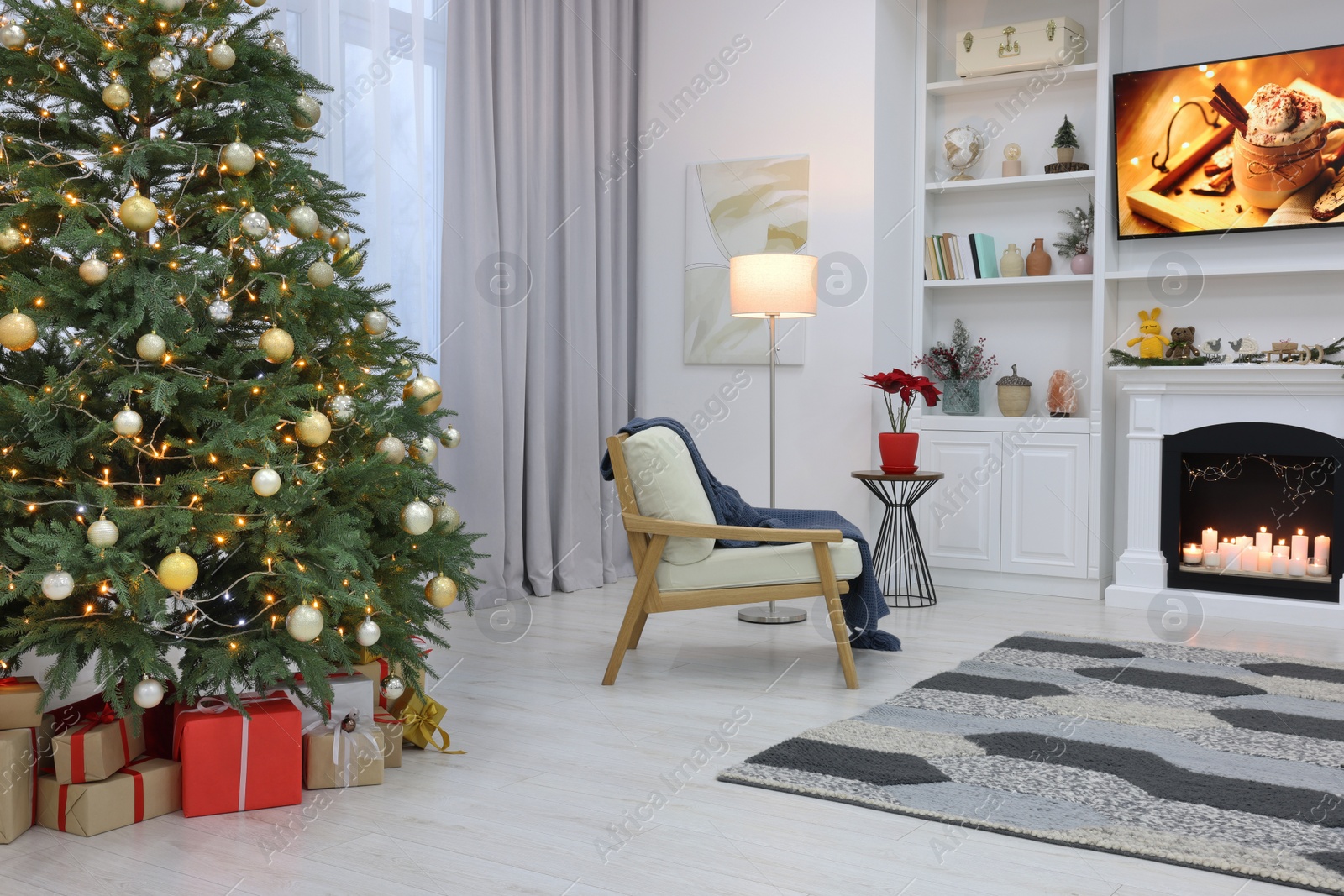 Photo of Beautiful tree with festive lights and Christmas decor in living room. Interior design