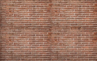 Texture of old red brick wall as background