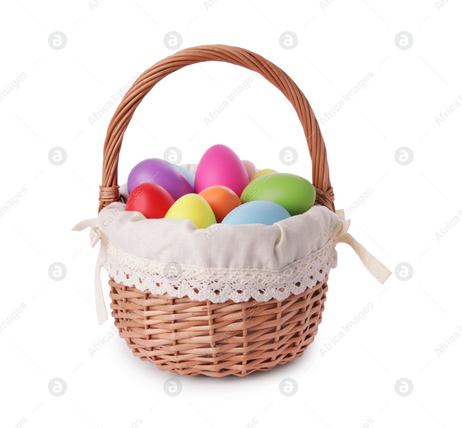 Photo of Wicker basket with beautifully painted Easter eggs isolated on white