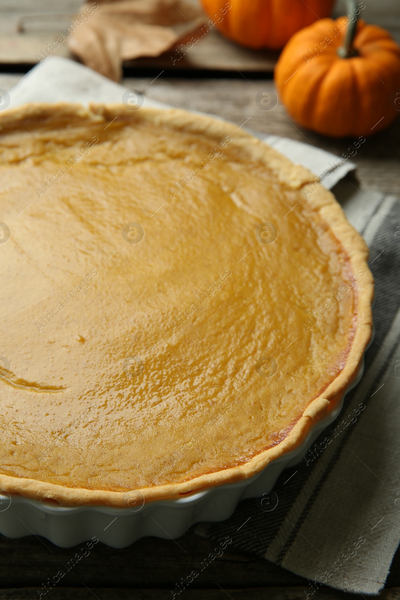 Photo of Delicious fresh pumpkin pie on table, closeup