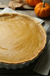 Delicious fresh pumpkin pie on table, closeup